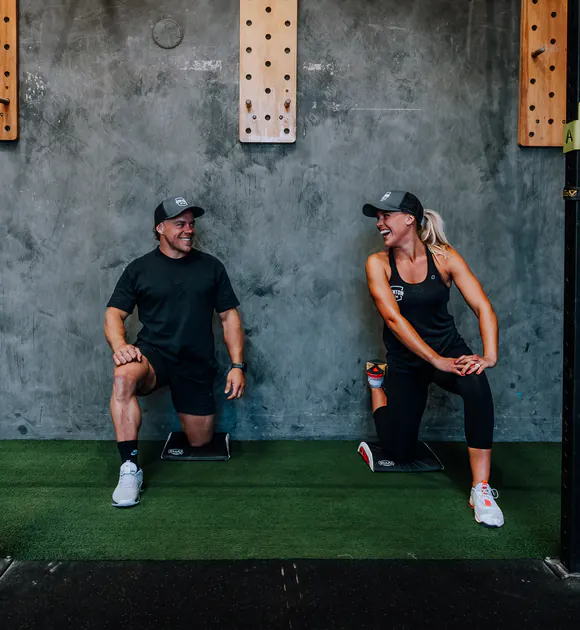 Ben and Lizzy sharing a laugh at Benton Gym